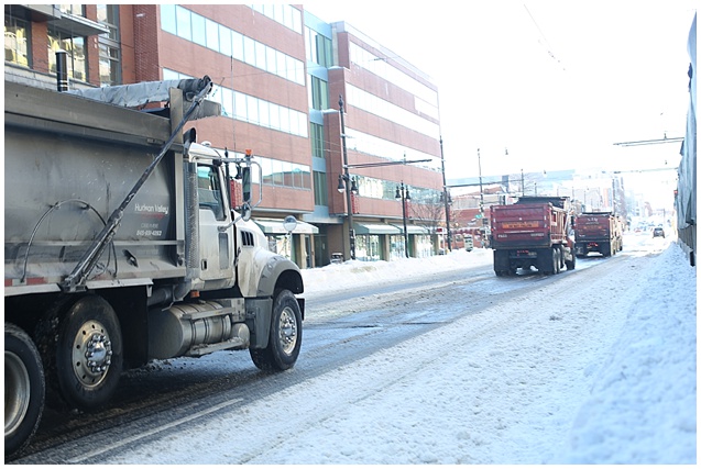 dump trucks hauling out the city's snow 