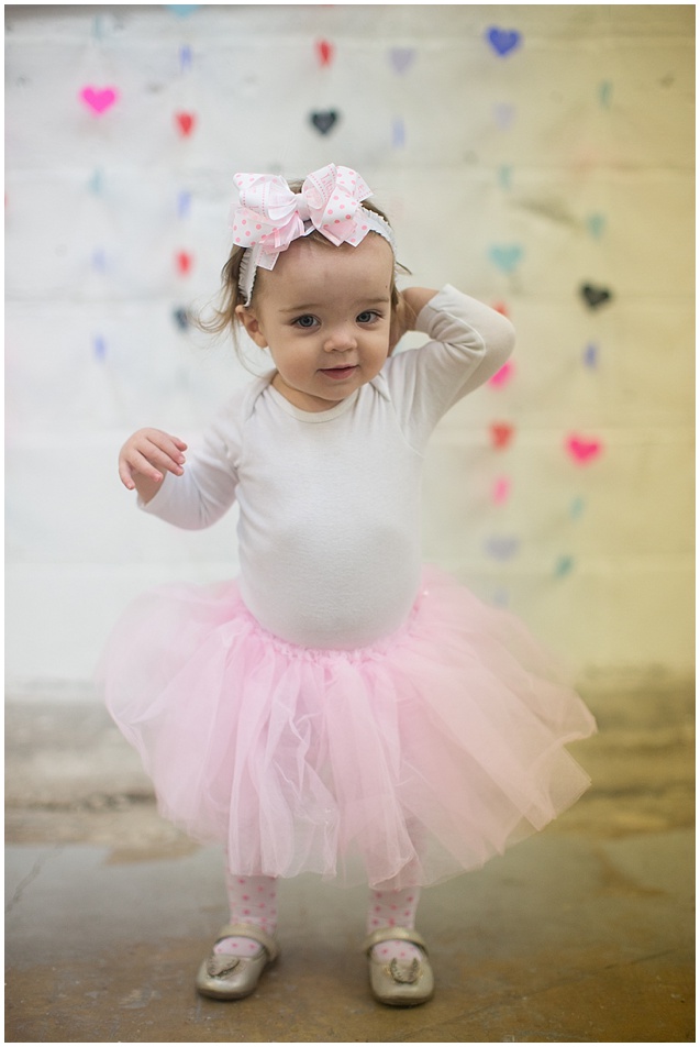 I can hardly believe it was just a year ago and I shot her newborn photos. She is quiet, calm, and an all around ball of sweetness. The delicate pink rosettes and colored hearts fit her perfectly.  Happy Birthday Francesca! 