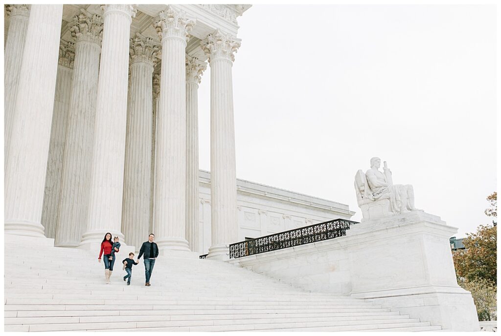 family walking down the stairs at the Supreme Court 