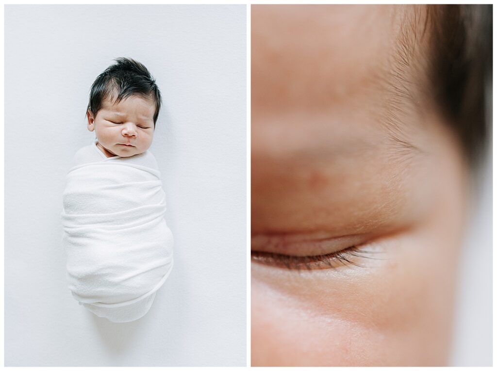 Newborn baby boy wrapped in a white swaddle 