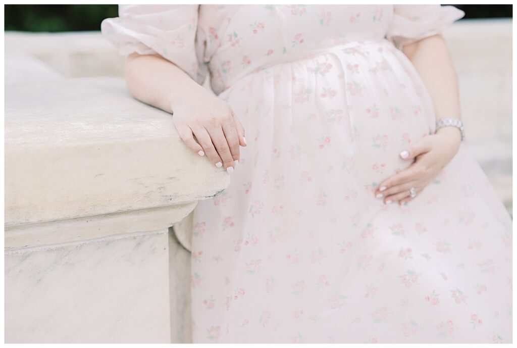 baby bump with pink floral dress 